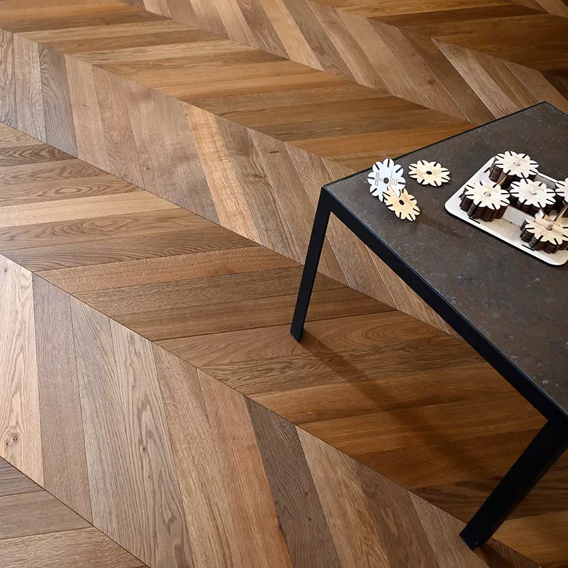 Parquet teak scuro spina francese - Parquet spina francese - Hausfloor